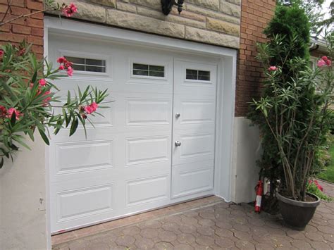 garage door with man door outside